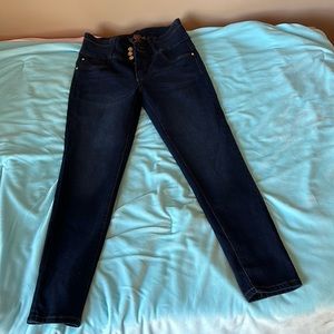 Skinny dark blue jeans
